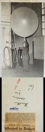 1941--Man Holding a Helium-Filled Radiosonde Balloon, Spokane, WA